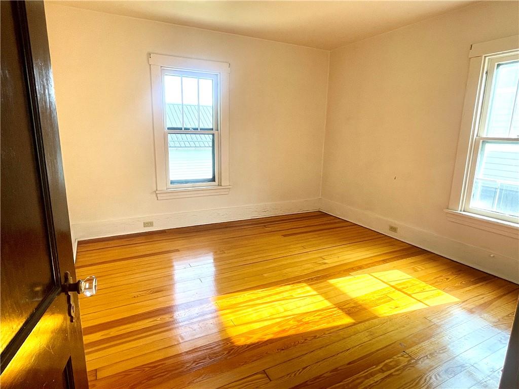 315 Spruce Street Butler, PA 16001 - Photo 27 of 38 a view of a room with wooden floor and a window