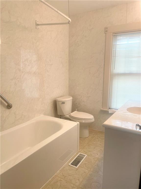 315 Spruce Street Butler, PA 16001 - Photo 28 of 38 a bathroom with a sink a toilet and a bathtub