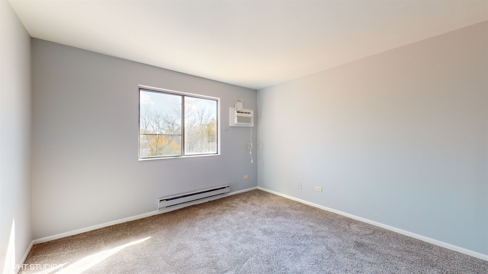 651 South Virginia Road, Unit 326 Crystal Lake, IL 60014 - Photo 15 of 26 an empty room with a window