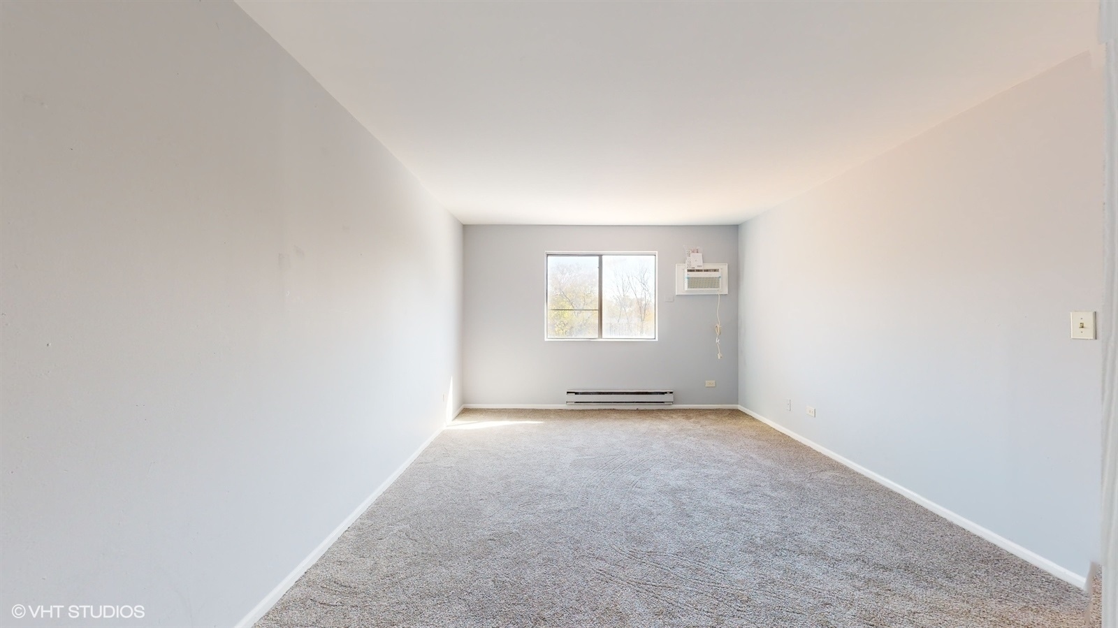651 South Virginia Road, Unit 326 Crystal Lake, IL 60014 - Photo 16 of 26 an empty room with windows