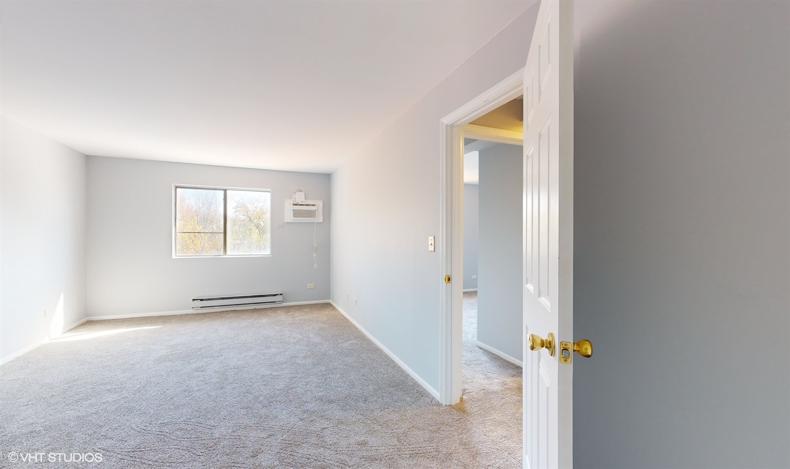 651 South Virginia Road, Unit 326 Crystal Lake, IL 60014 - Photo 19 of 26 an empty room with windows