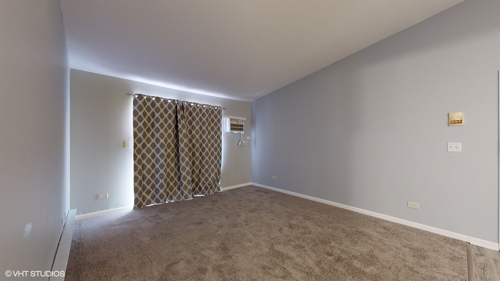 651 South Virginia Road, Unit 326 Crystal Lake, IL 60014 - Photo 2 of 26 an empty room with windows