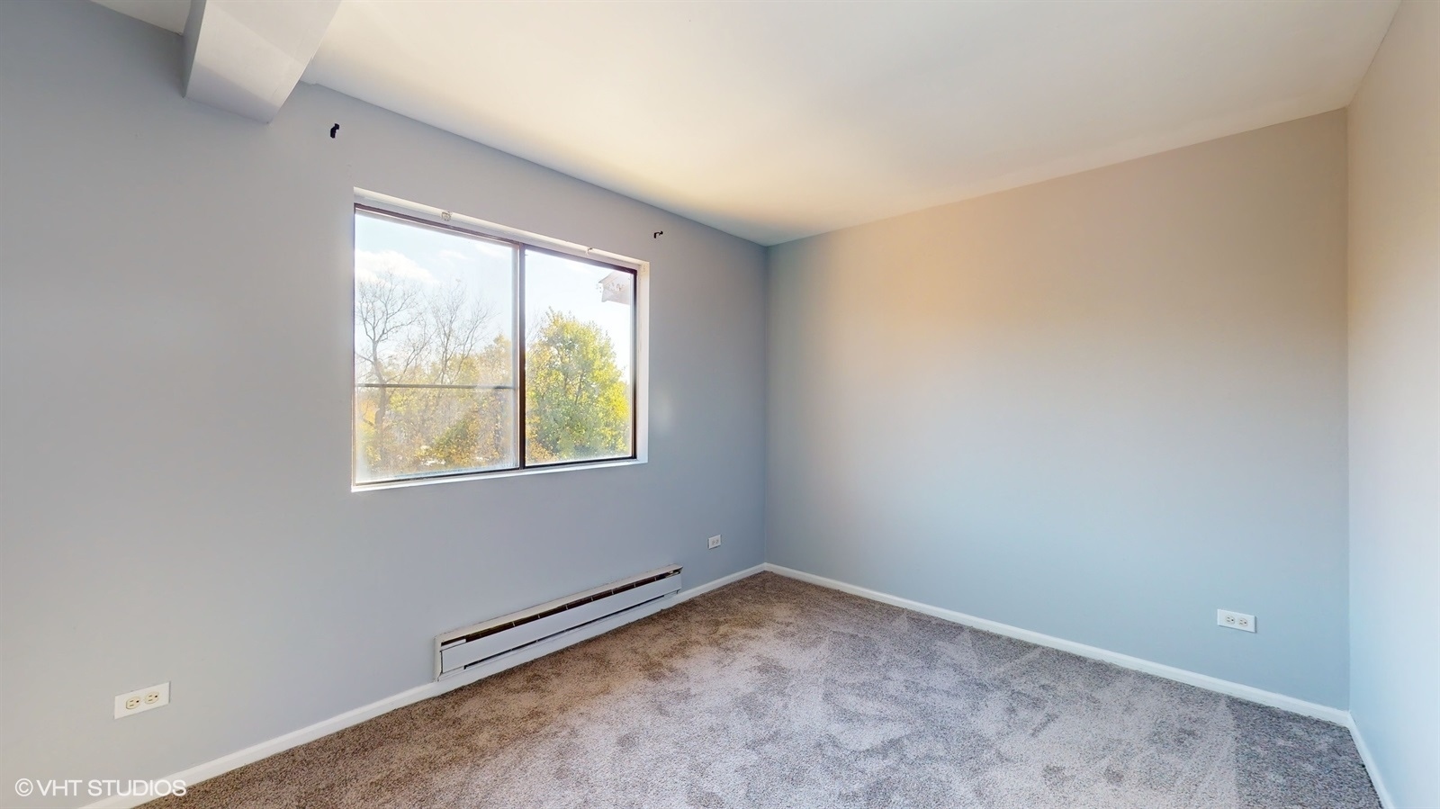 651 South Virginia Road, Unit 326 Crystal Lake, IL 60014 - Photo 21 of 26 an empty room with windows