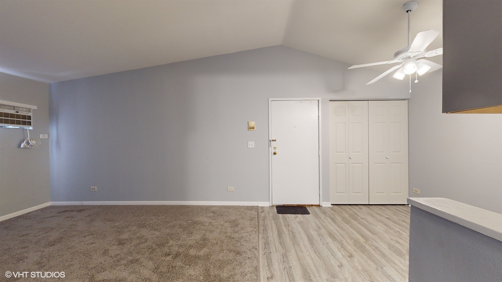 651 South Virginia Road, Unit 326 Crystal Lake, IL 60014 - Photo 9 of 26 a view of an empty room with wooden floor