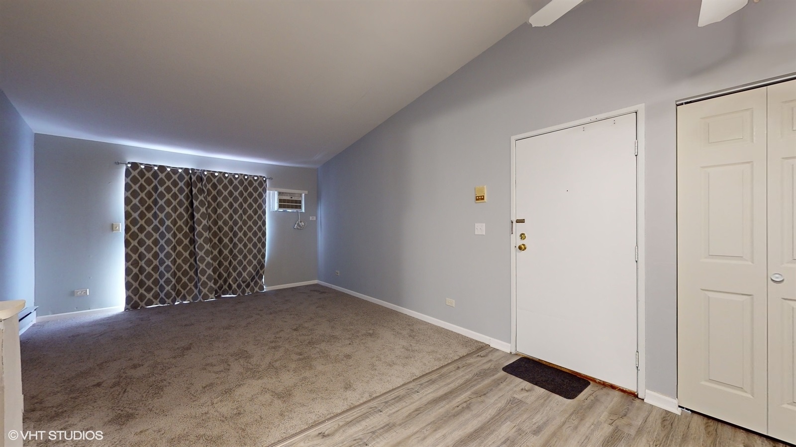 651 South Virginia Road, Unit 326 Crystal Lake, IL 60014 - Photo 10 of 26 an empty room with wooden floor