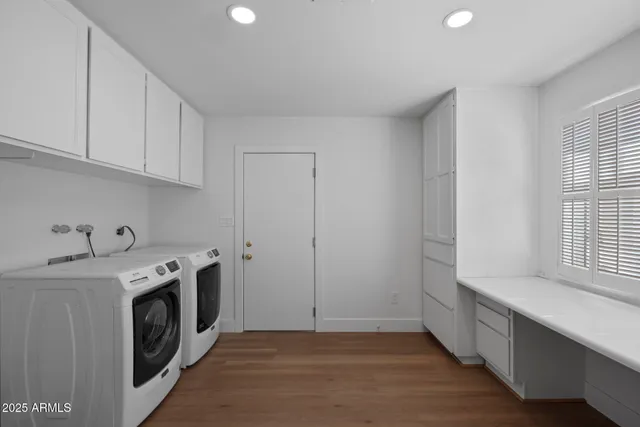a view of a kitchen with electric appliances