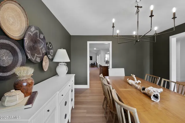 a dining room with wooden floor