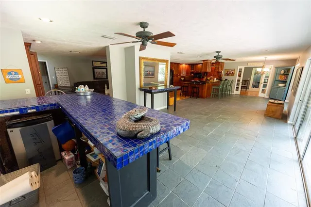 a living room filled with furniture and a table