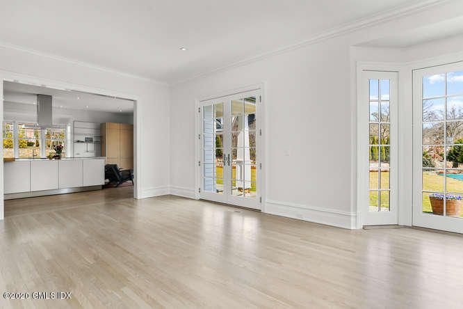 60 Club Road Riverside, CT 06878 - Photo 17 of 44 an empty room with wooden floor and windows