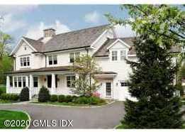 60 Club Road Riverside, CT 06878 - Photo 2 of 44 a front view of a house with a garden