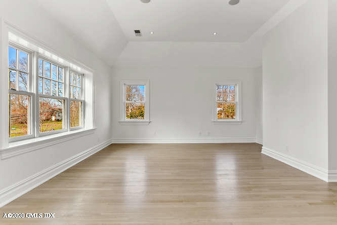 60 Club Road Riverside, CT 06878 - Photo 23 of 44 wooden floor in an empty room with a window