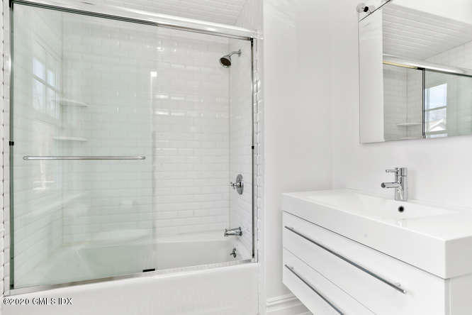 60 Club Road Riverside, CT 06878 - Photo 27 of 44 a bathroom with a shower and a sink