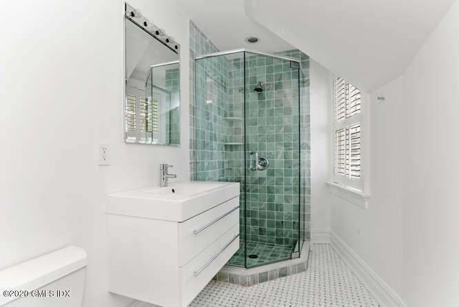 60 Club Road Riverside, CT 06878 - Photo 28 of 44 a bathroom with a sink a toilet and shower