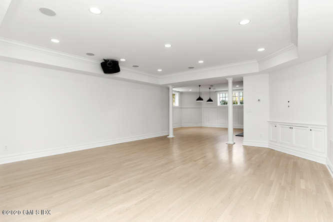 60 Club Road Riverside, CT 06878 - Photo 34 of 44 an empty room with wooden floor and windows