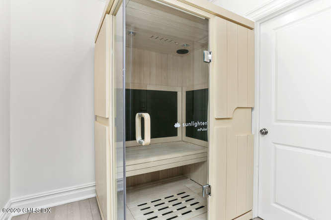 60 Club Road Riverside, CT 06878 - Photo 38 of 44 a bathroom with a sink and a mirror