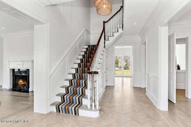 60 Club Road Riverside, CT 06878 - Photo 5 of 44 a view of entryway and hall with wooden floor