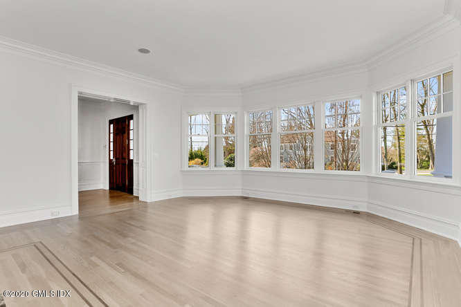60 Club Road Riverside, CT 06878 - Photo 8 of 44 wooden floor in an empty room with a window