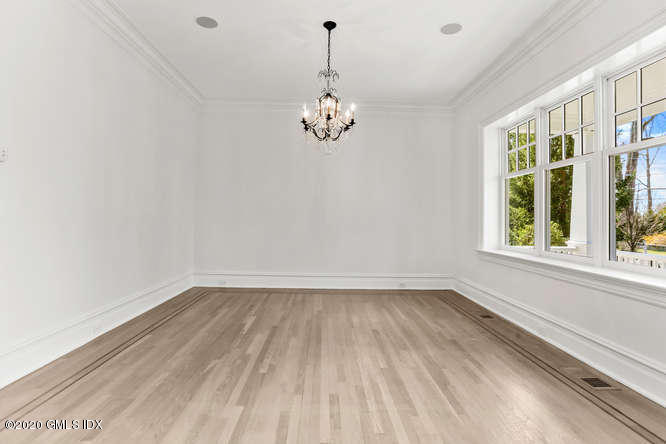 60 Club Road Riverside, CT 06878 - Photo 10 of 44 wooden floor in an empty room with a window