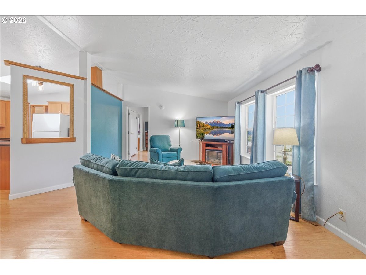 475 East 9th Street Rainier, OR 97048 - Photo 6 of 43 a living room with furniture and a wooden floor