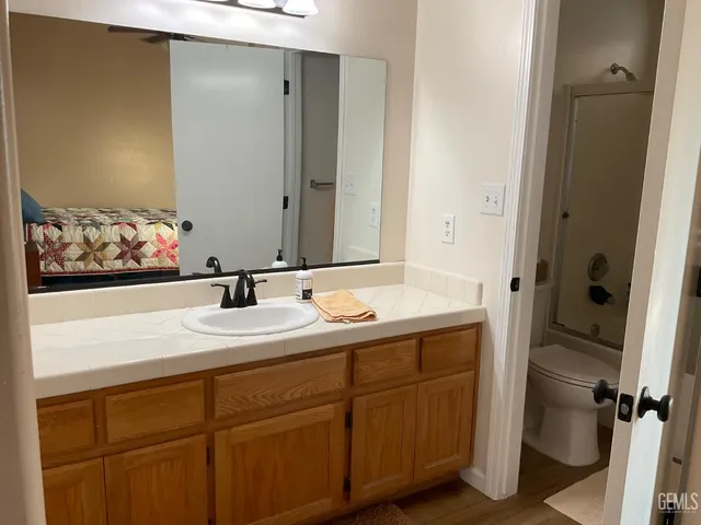 a bathroom with a sink and mirror
