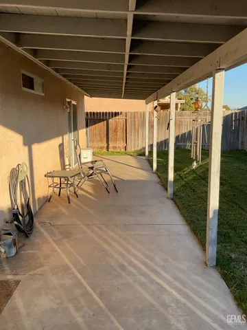 a view of backyard with cabin