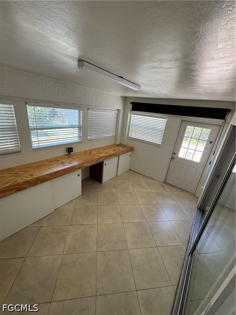 3313 35th Street West Lehigh Acres, FL 33971 - Photo 15 of 15 a view of an empty room and window