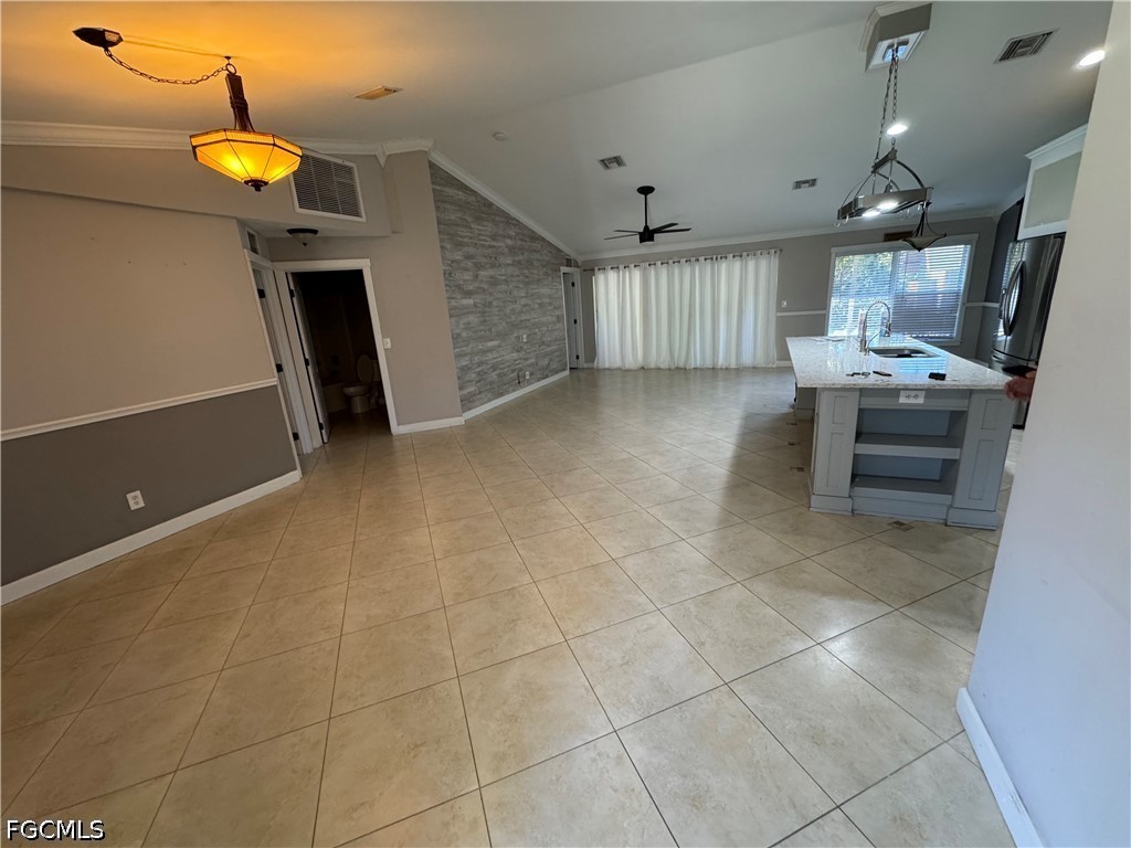 3313 35th Street West Lehigh Acres, FL 33971 - Photo 2 of 15 a view of kitchen with furniture and window