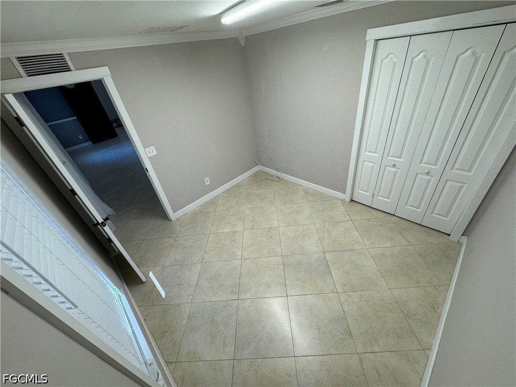 3313 35th Street West Lehigh Acres, FL 33971 - Photo 5 of 15 a view of an empty room