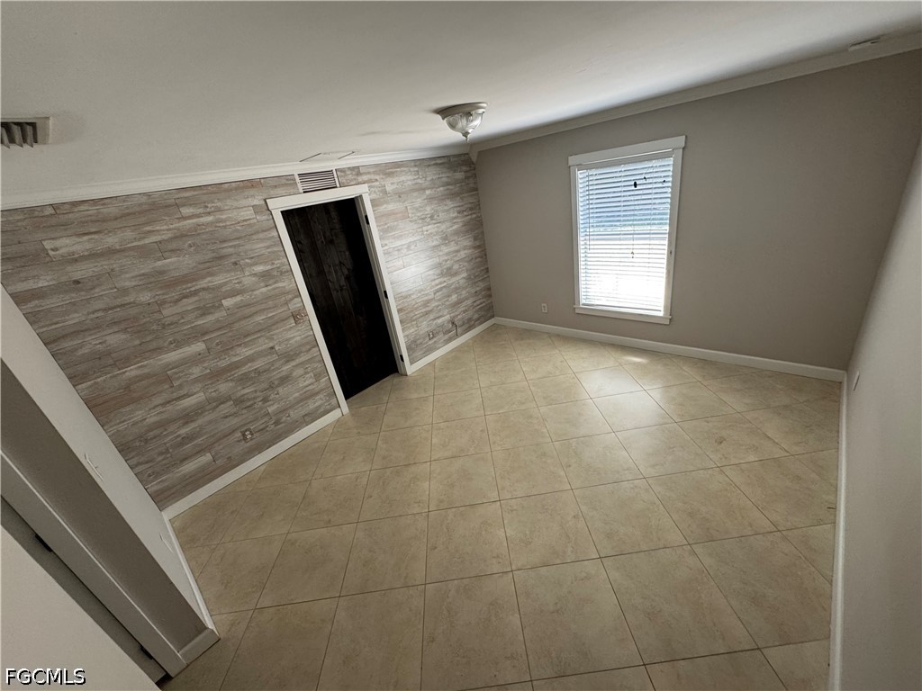 3313 35th Street West Lehigh Acres, FL 33971 - Photo 9 of 15 a view of an empty room and window