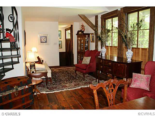 13003 Hanover Courthouse Road Hanover, VA 23069 - Photo 4 of 24 a living room with furniture and a floor to ceiling window