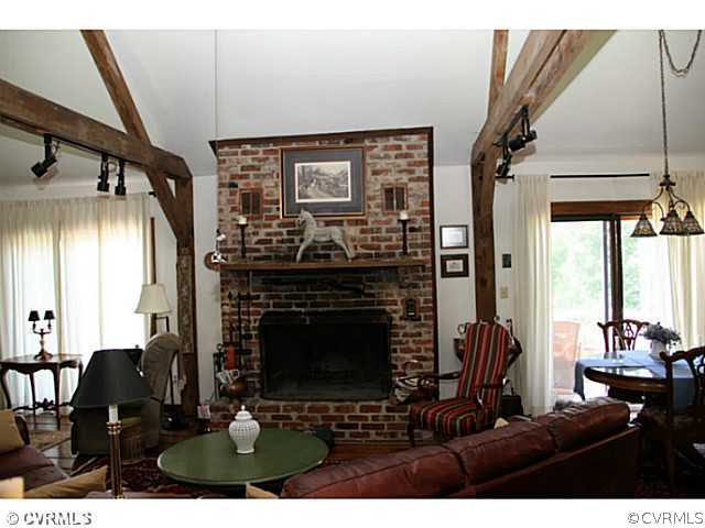13003 Hanover Courthouse Road Hanover, VA 23069 - Photo 8 of 24 a view of a livingroom with furniture and a fireplace