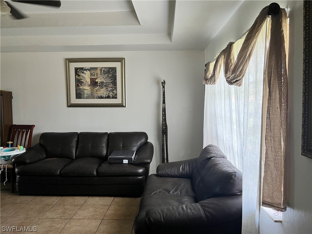 8240-8242 Matanzas Road Fort Myers, FL 33967 - Photo 2 of 8 a living room with furniture and a window