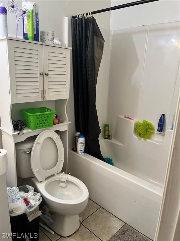 8240-8242 Matanzas Road Fort Myers, FL 33967 - Photo 8 of 8 a bathroom with a toilet sink and mirror