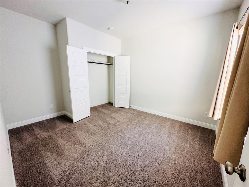 806 Davids Way Allen, TX 75013 - Photo 10 of 24 a view of an empty room