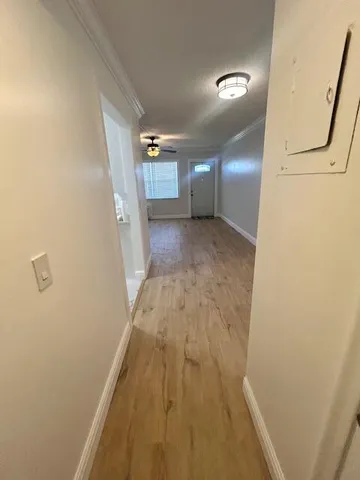 a view of hallway with stairs