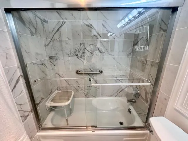 a bathroom with a sink and toilet