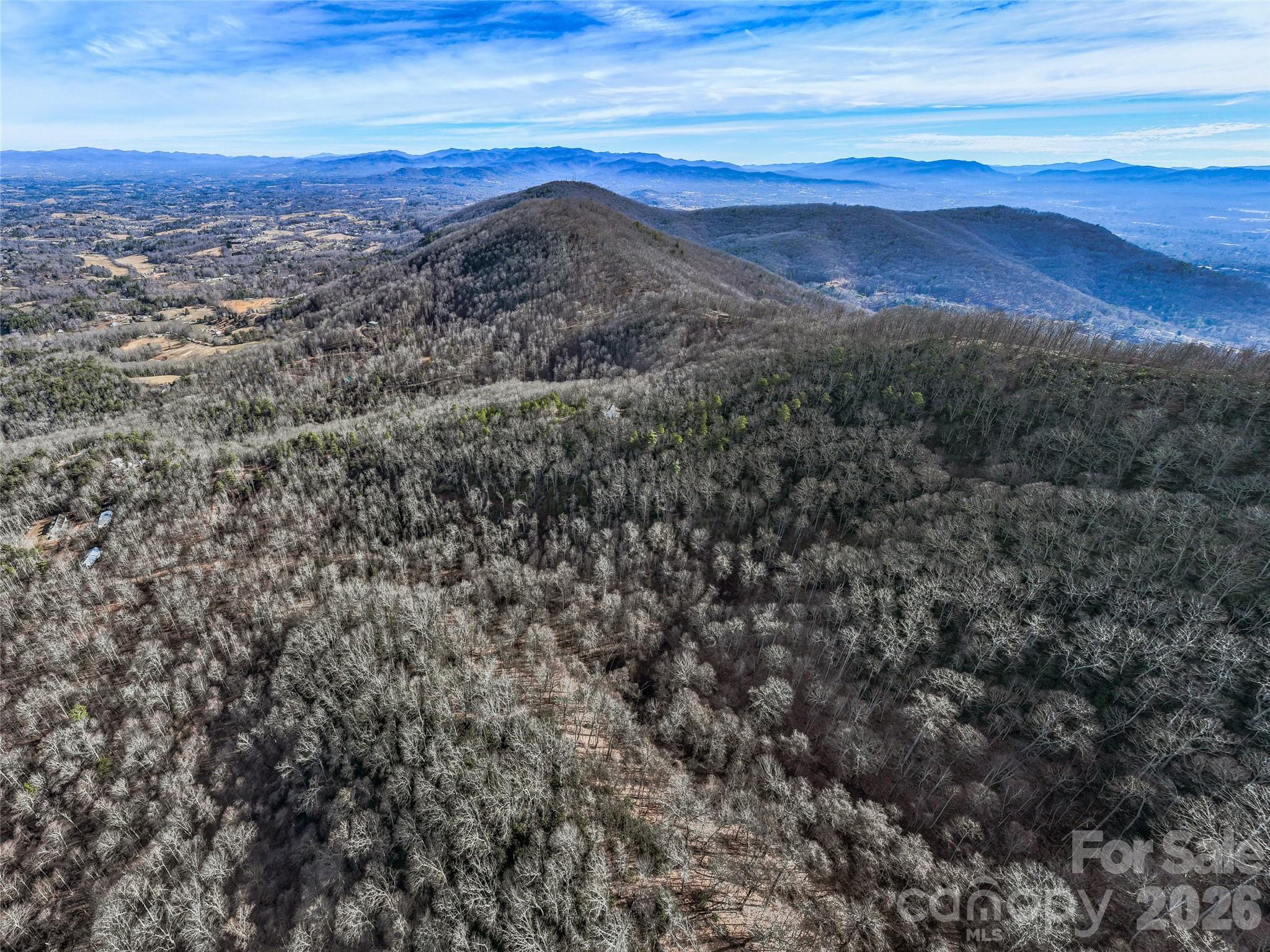99999 High Top Mountain Road Leicester, NC 28748 - Photo 2 of 29 a view of a sky from a city