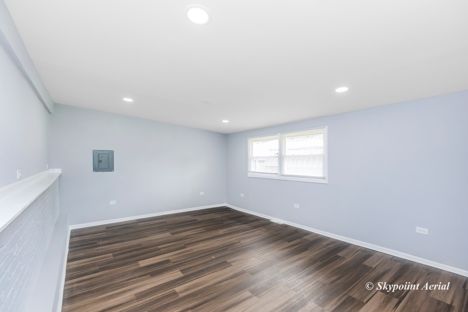 3145 Nottingham Avenue Markham, IL 60428 - Photo 14 of 27 a view of a room with wooden floor and fan