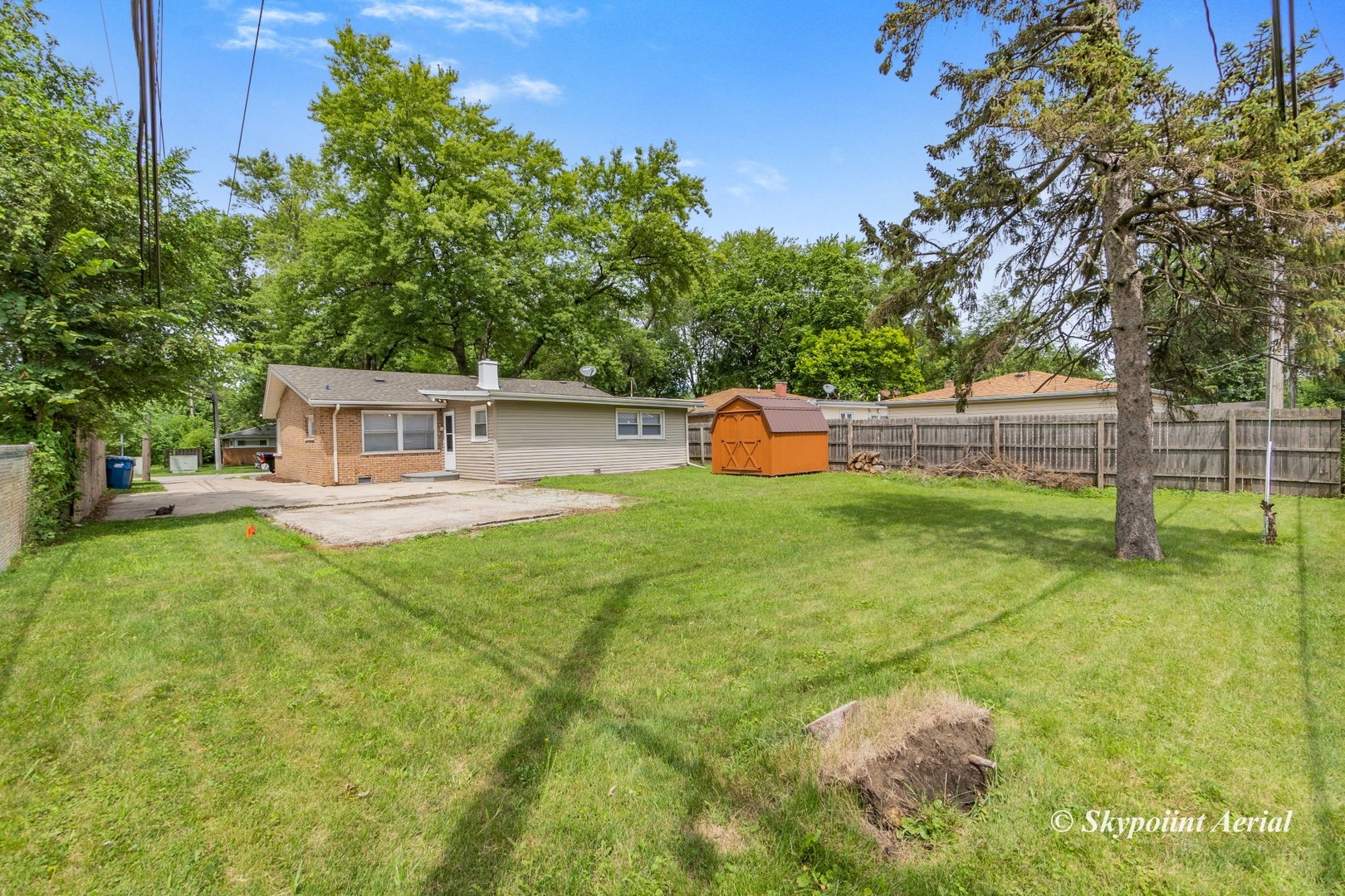 3145 Nottingham Avenue Markham, IL 60428 - Photo 16 of 27 a view of a house with backyard and sitting area