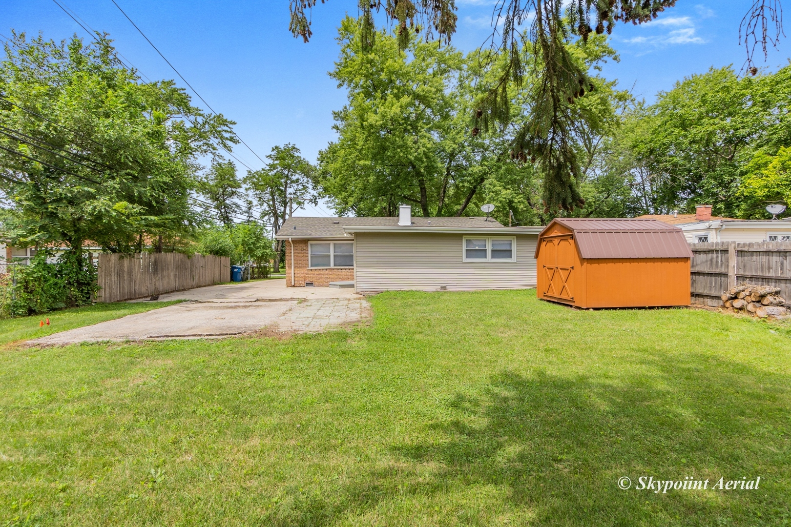 3145 Nottingham Avenue Markham, IL 60428 - Photo 18 of 27 a backyard of a house with table and chairs