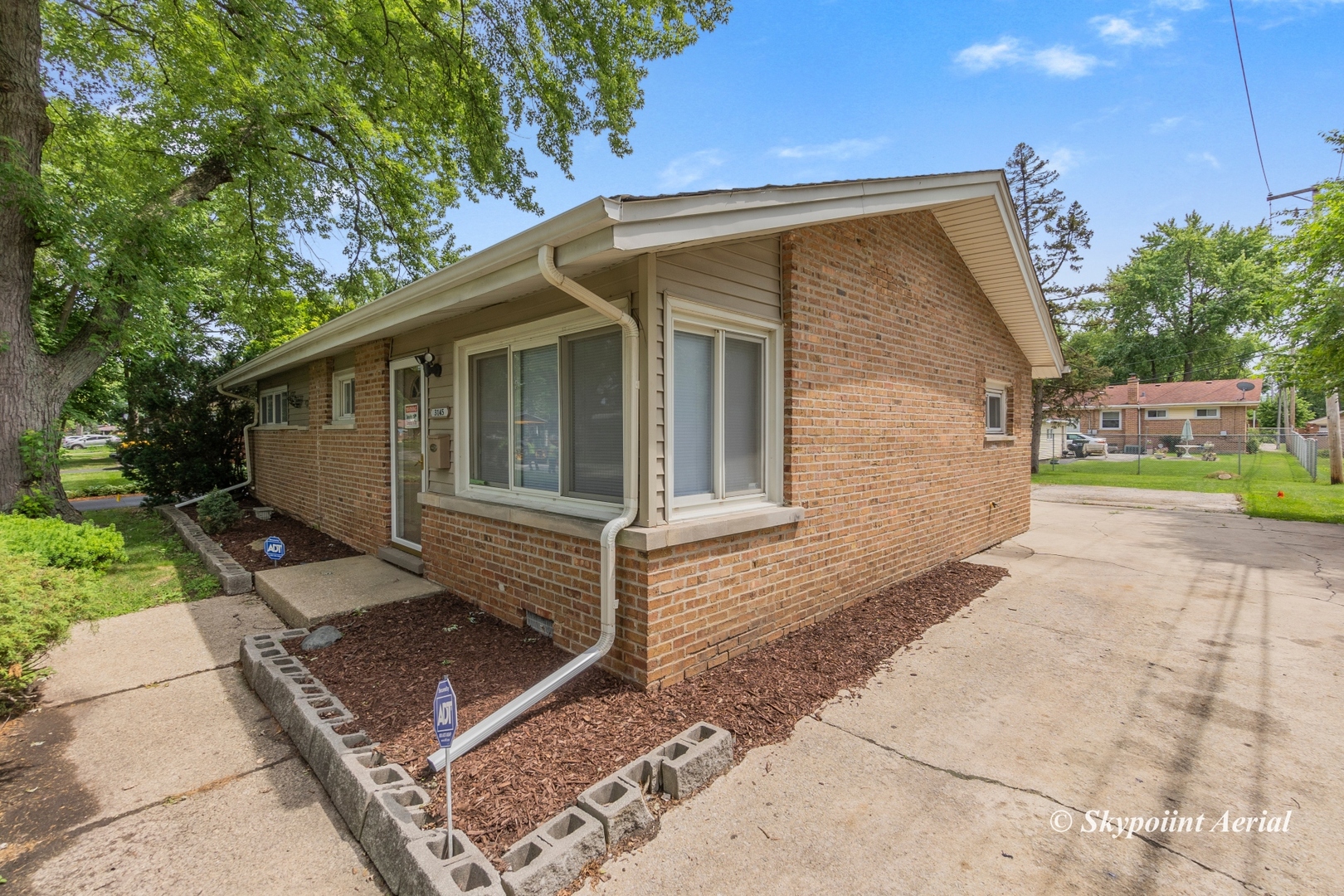 3145 Nottingham Avenue Markham, IL 60428 - Photo 20 of 27 a view of a house with a yard