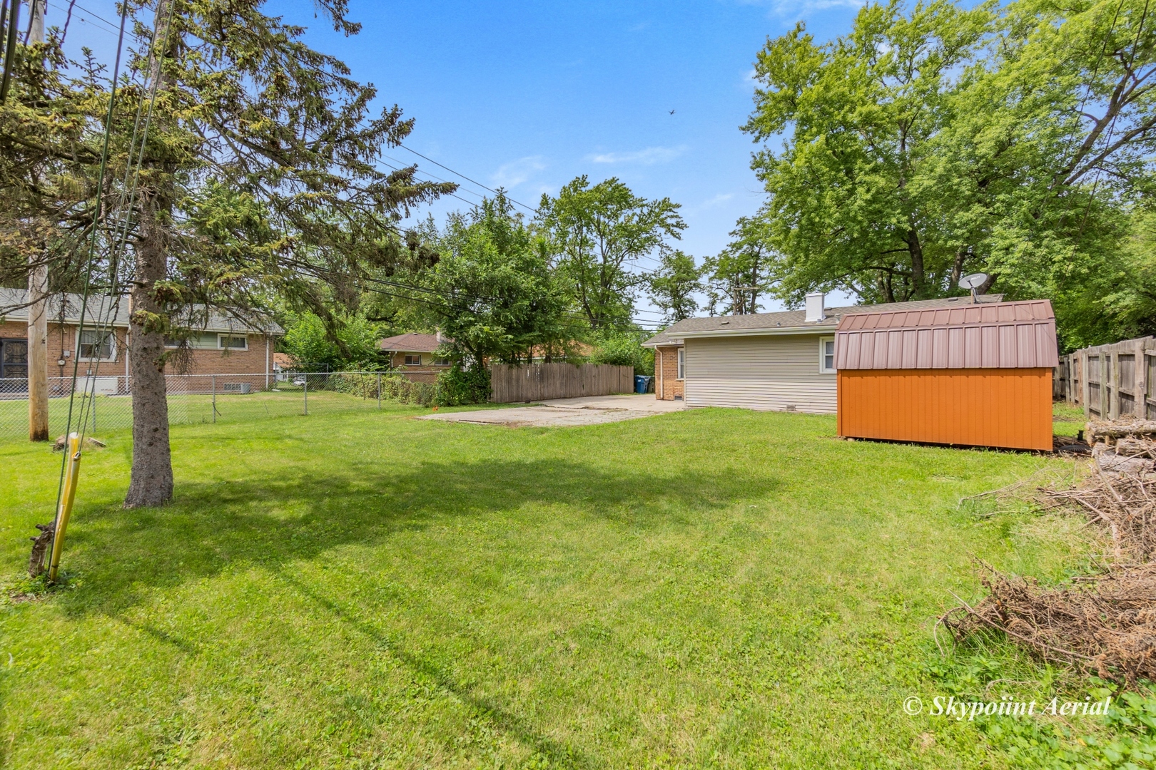 3145 Nottingham Avenue Markham, IL 60428 - Photo 22 of 27 a view of a backyard with large trees