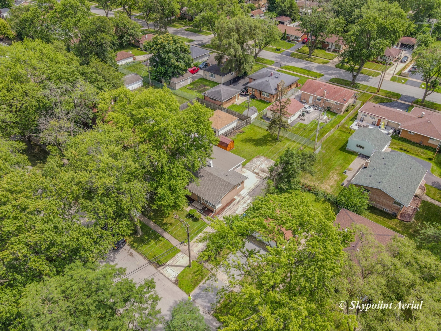 3145 Nottingham Avenue Markham, IL 60428 - Photo 27 of 27 an aerial view of residential house with outdoor space and trees all around