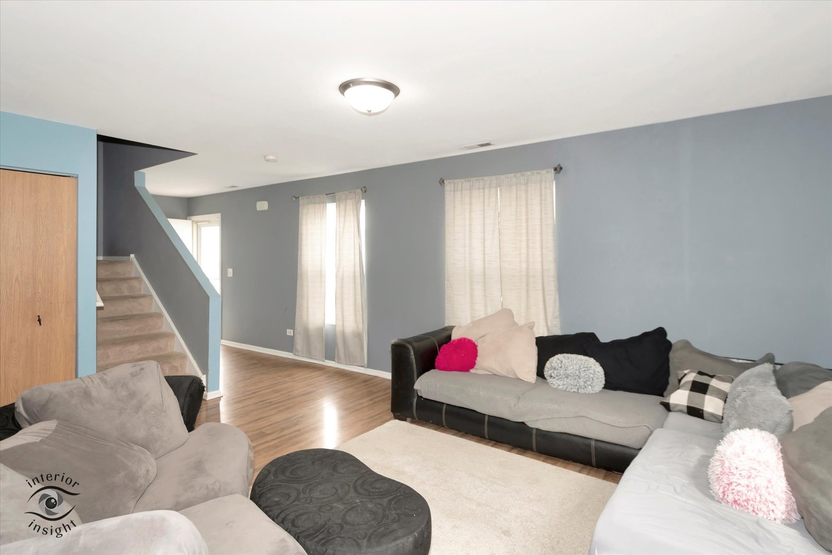 25219 Faraday Road Manhattan, IL 60442 - Photo 5 of 18 a living room with furniture and stairs