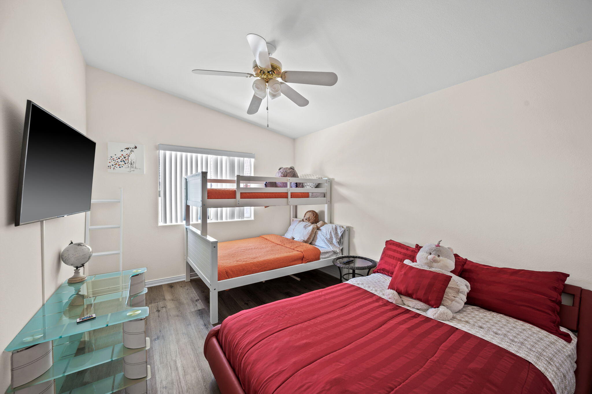 68210 Empalmo Road Cathedral City, CA 92234 - Photo 15 of 34 a bedroom with two beds and a flat screen tv