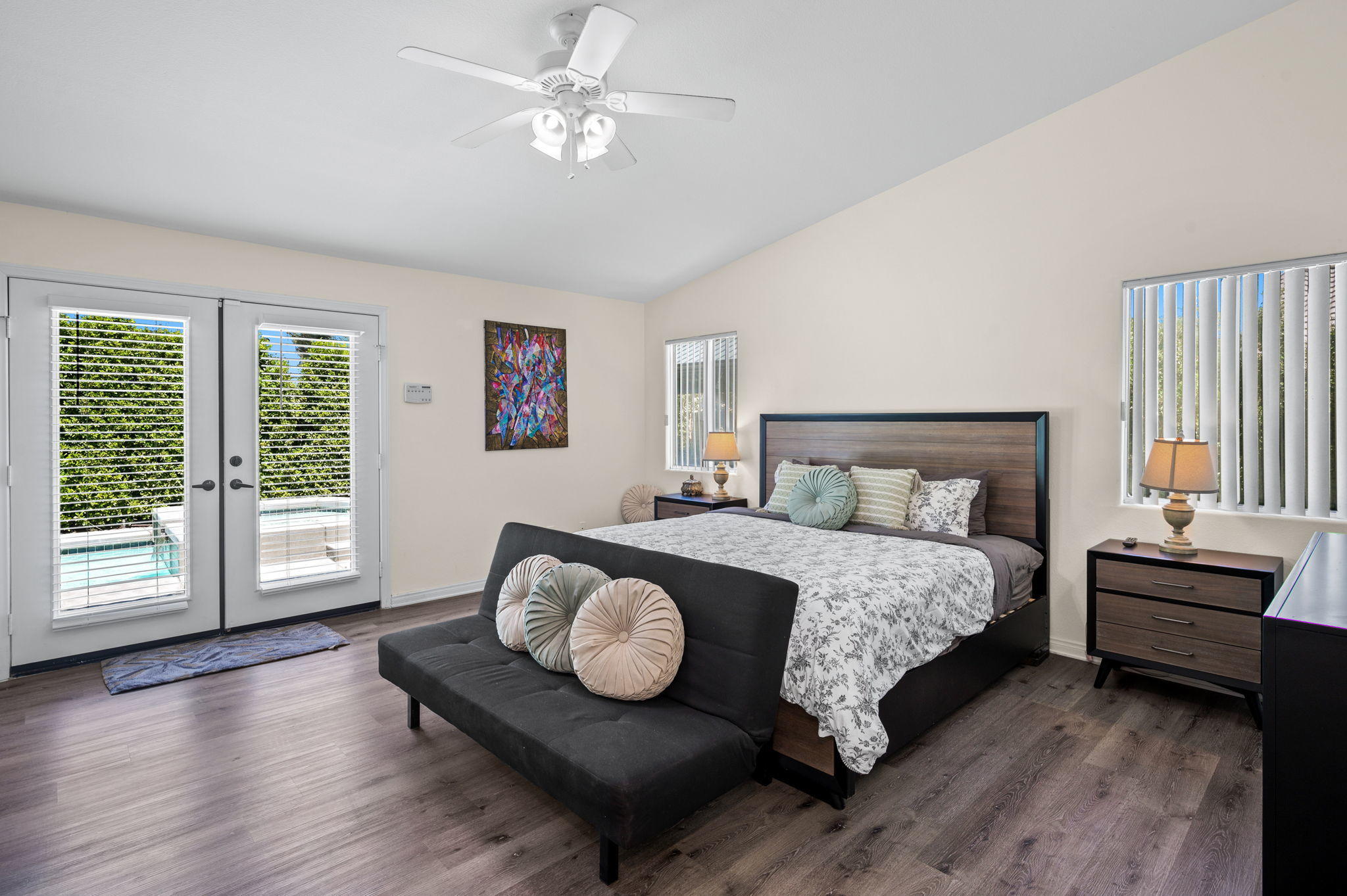 68210 Empalmo Road Cathedral City, CA 92234 - Photo 19 of 34 a bedroom with a bed and a large window