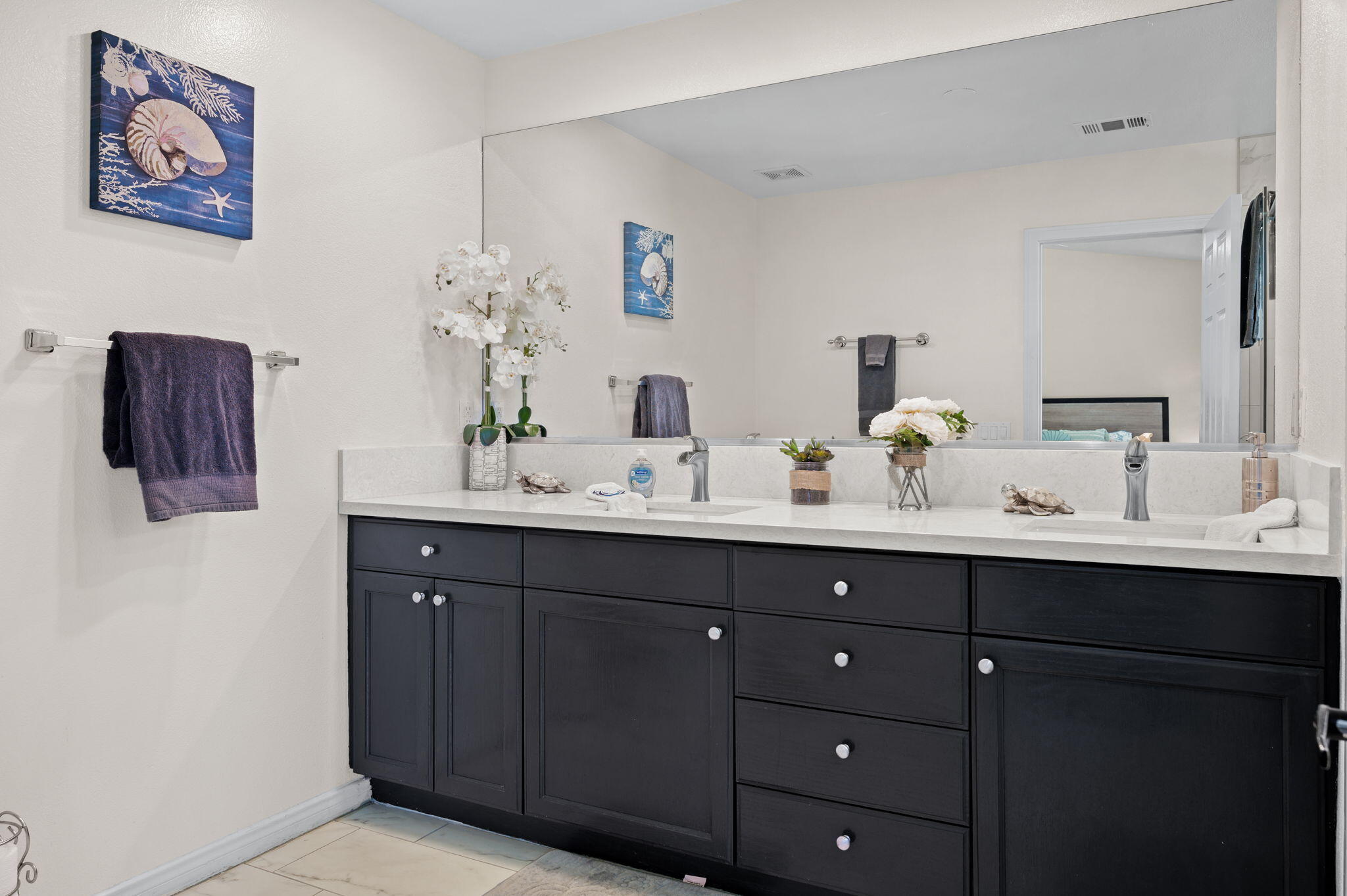 68210 Empalmo Road Cathedral City, CA 92234 - Photo 22 of 34 a bathroom with a double vanity sink and a mirror