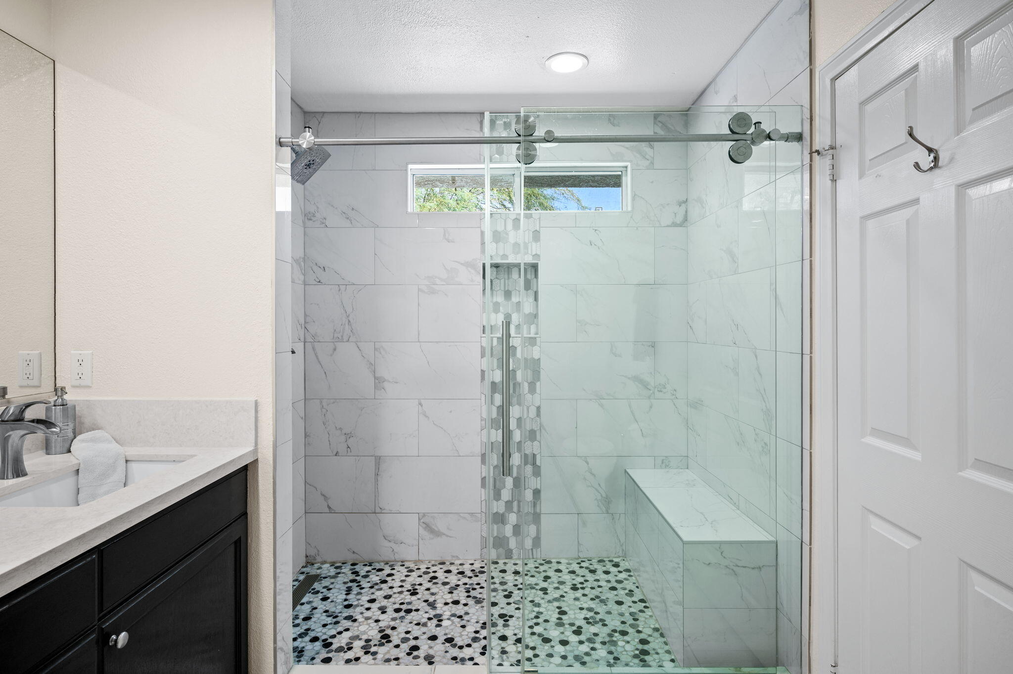 68210 Empalmo Road Cathedral City, CA 92234 - Photo 23 of 34 a bathroom with a shower and a sink