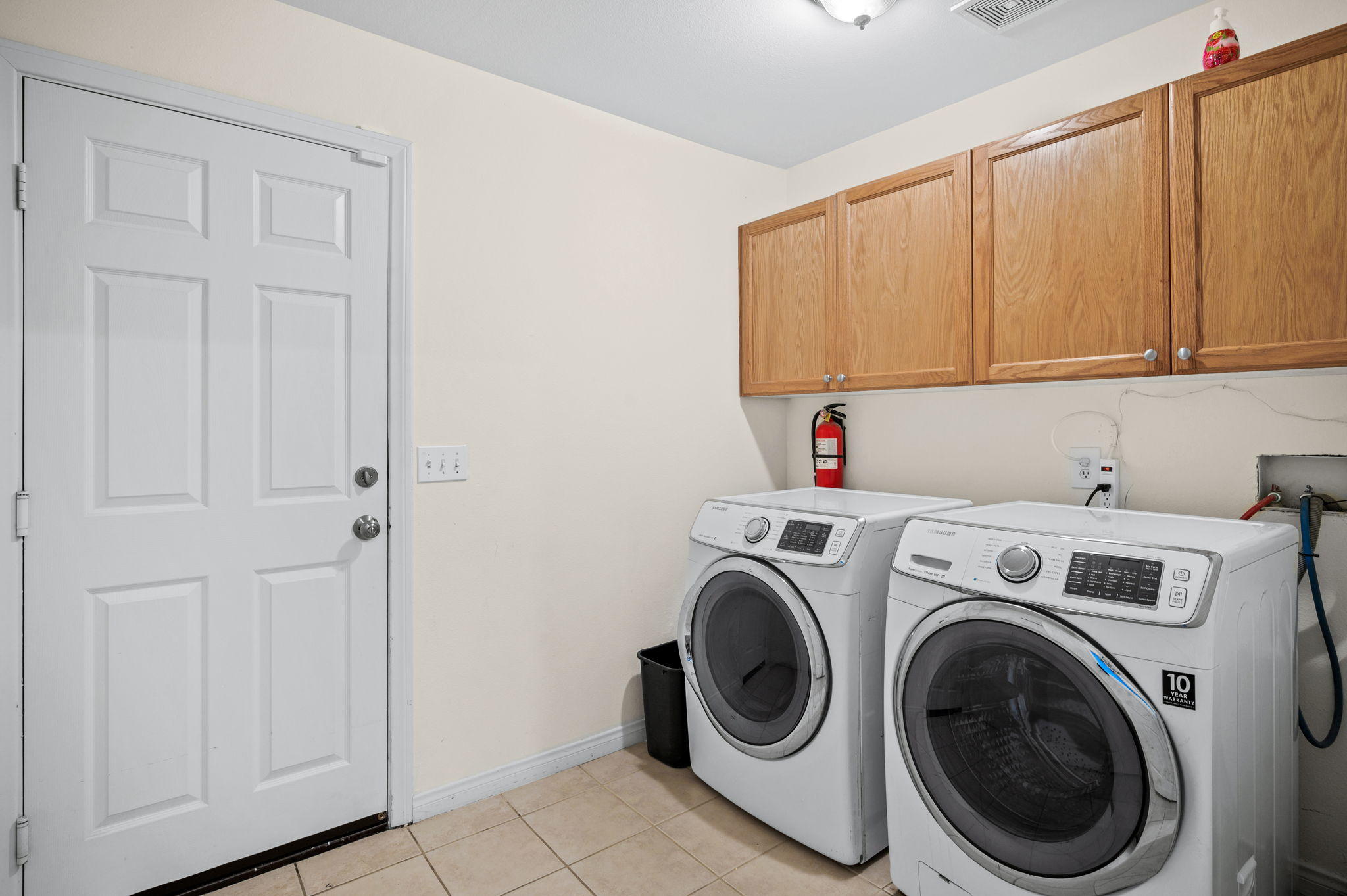 68210 Empalmo Road Cathedral City, CA 92234 - Photo 25 of 34 a utility room with dryer and washer