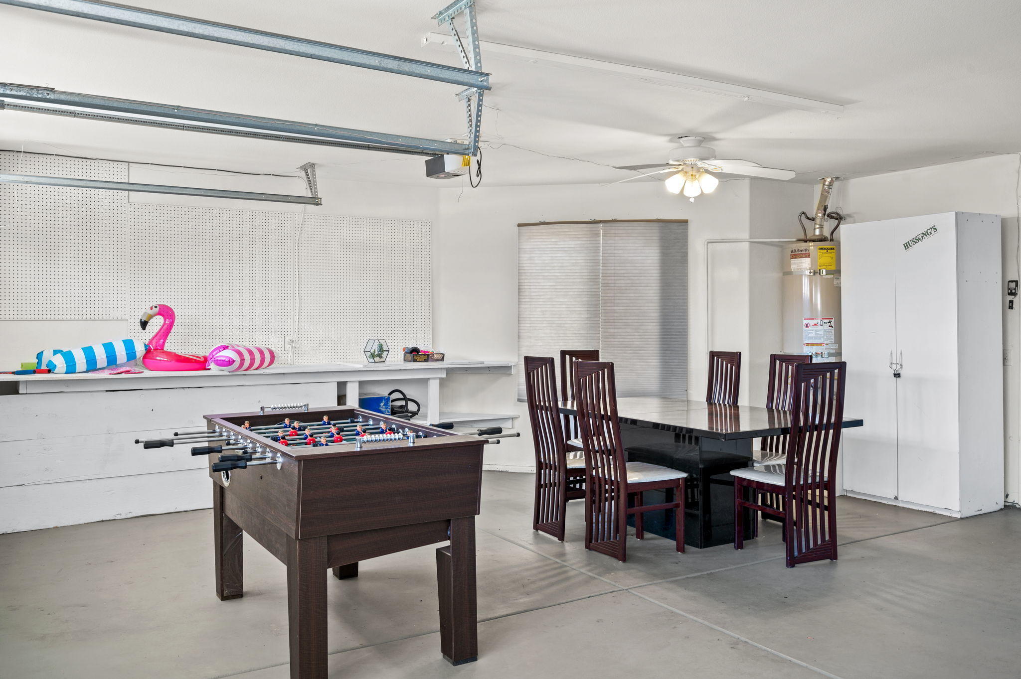 68210 Empalmo Road Cathedral City, CA 92234 - Photo 26 of 34 a view of a dining room with furniture and chandelier